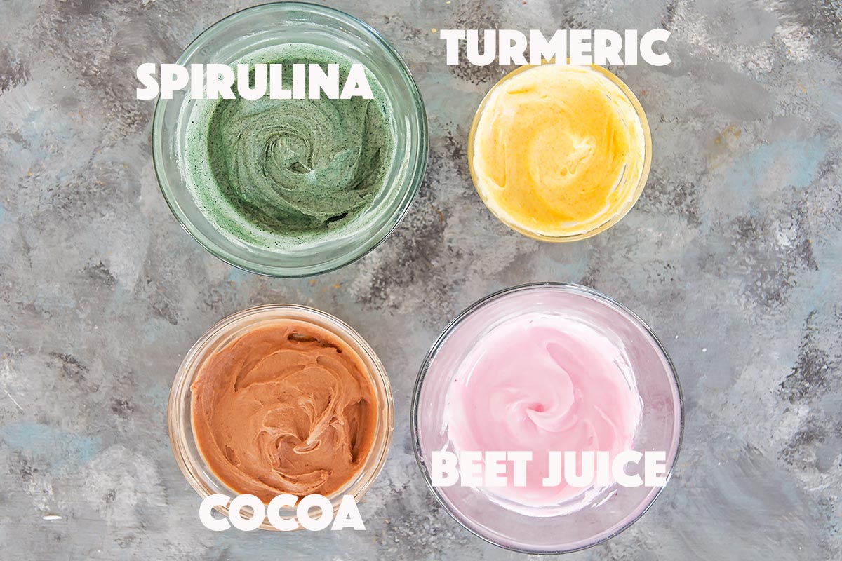 Naturally dyed royal icing, spirulina for green, turmeric for yellow, cocoa for brown, beet juice for pink