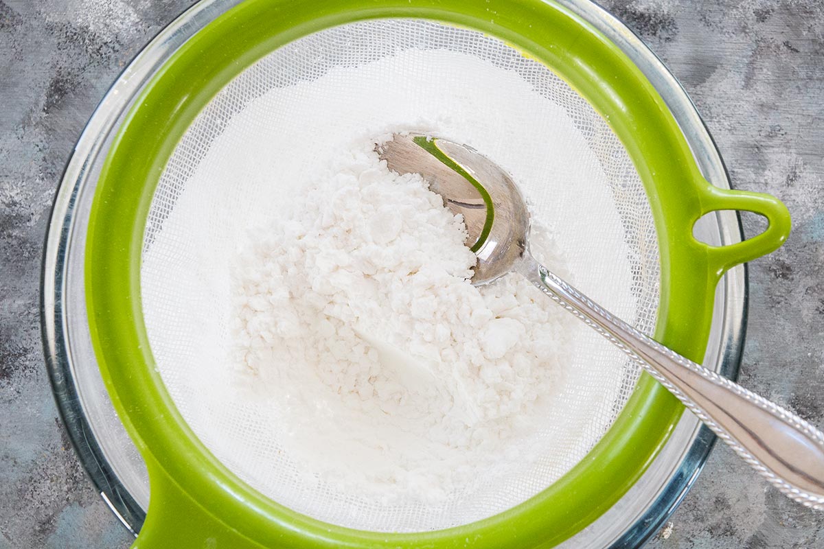 Powdered sugar in strainer