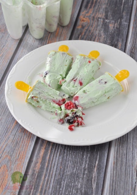 Berry Pistachio Popsicles on Plate