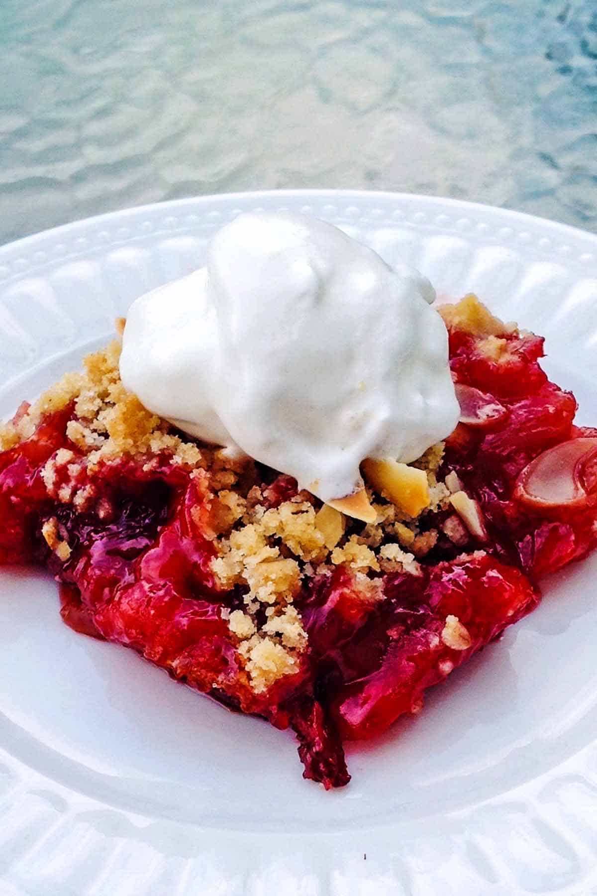 Rhubarb Crisp with whipped cream topping