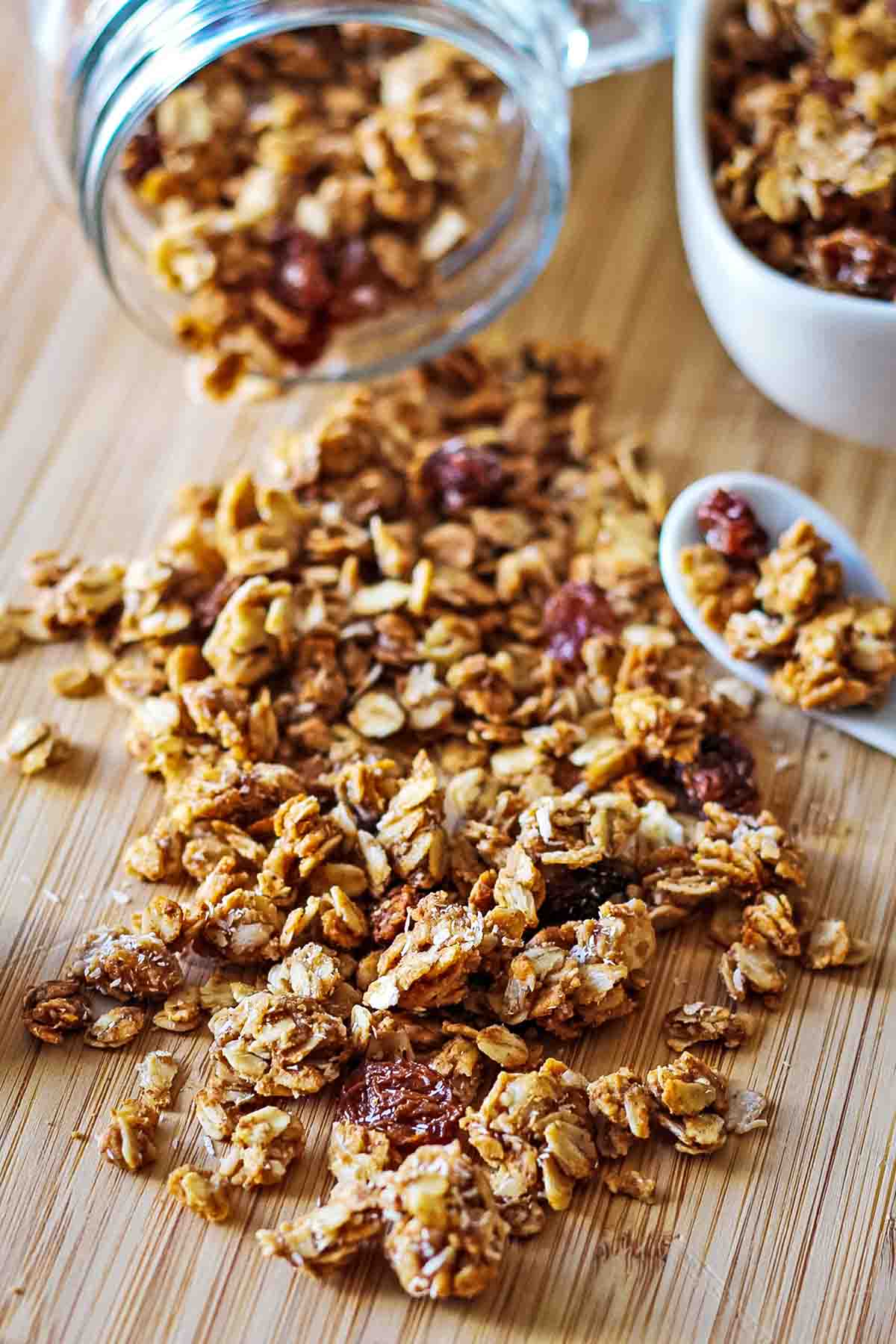 almond butter granola on wooden cutting board