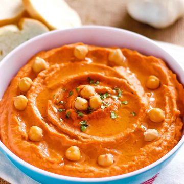 Roasted Red Pepper Hummus in blue bowl Recipe