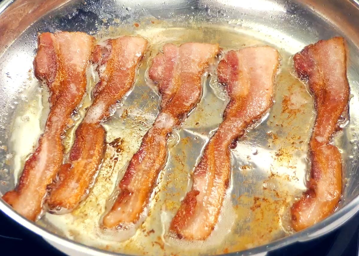 Bacon Strips Cooking in Pan