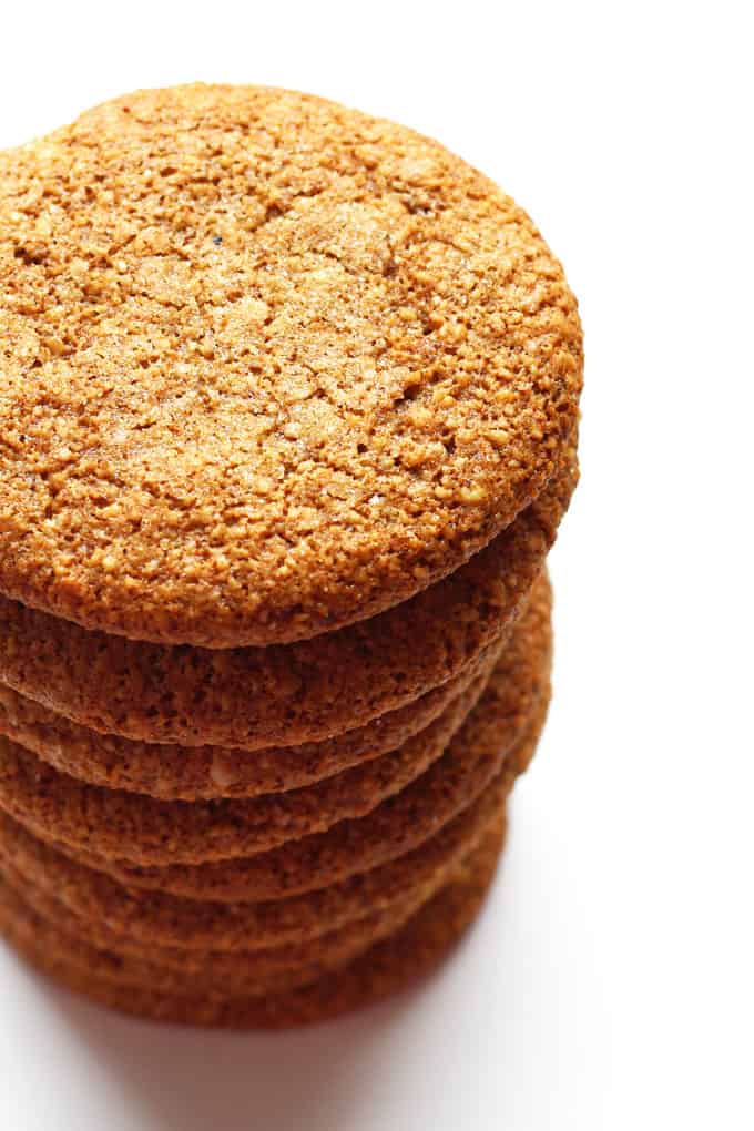 Almond flour molasses cookies in tall stack