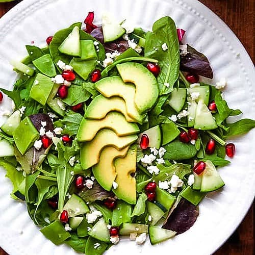 green goddess salad with avocado cucumber pomegranate goat cheese