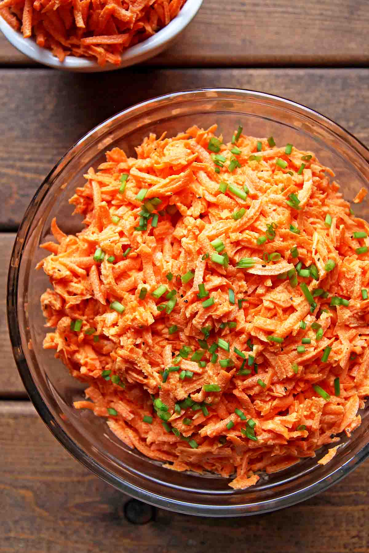 shredded raw carrot salad with green onion topping
