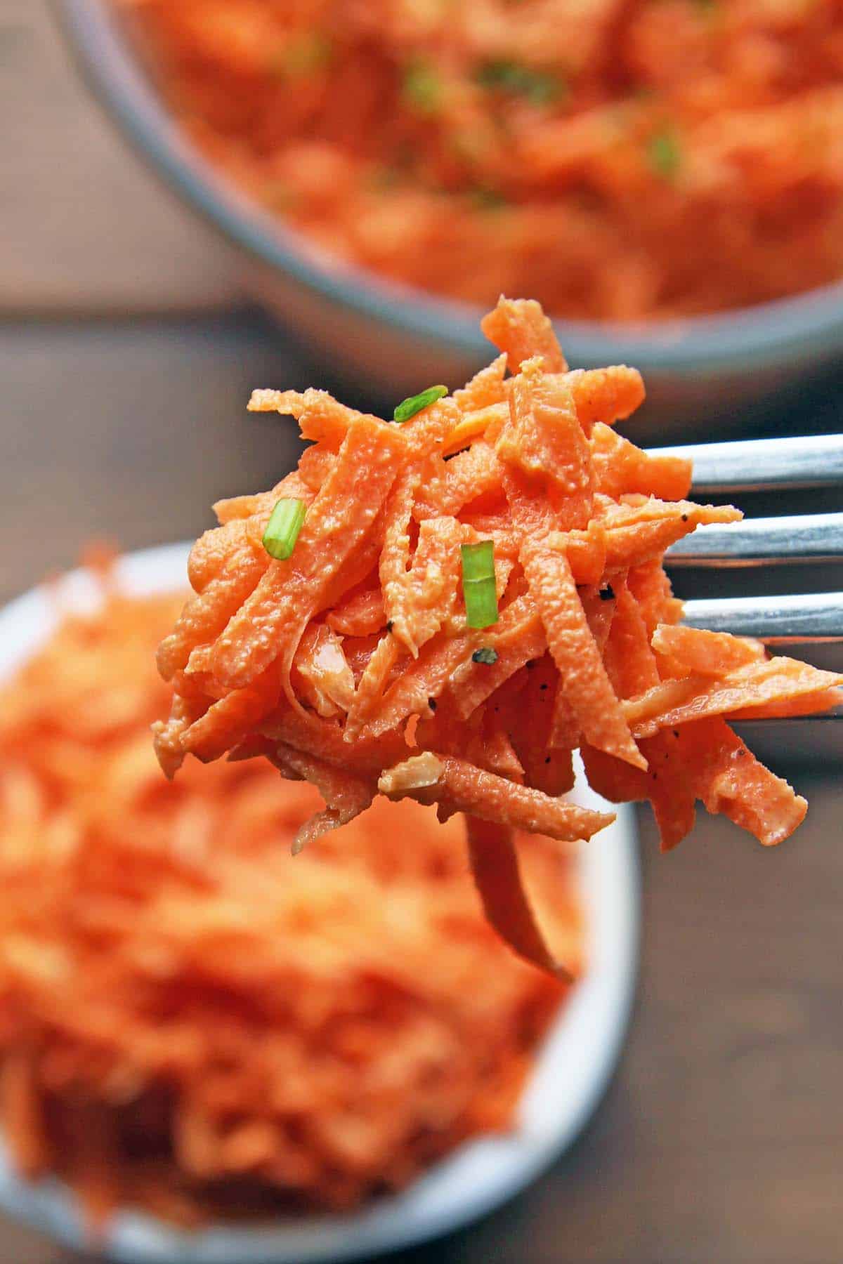 forkful of raw carrot salad