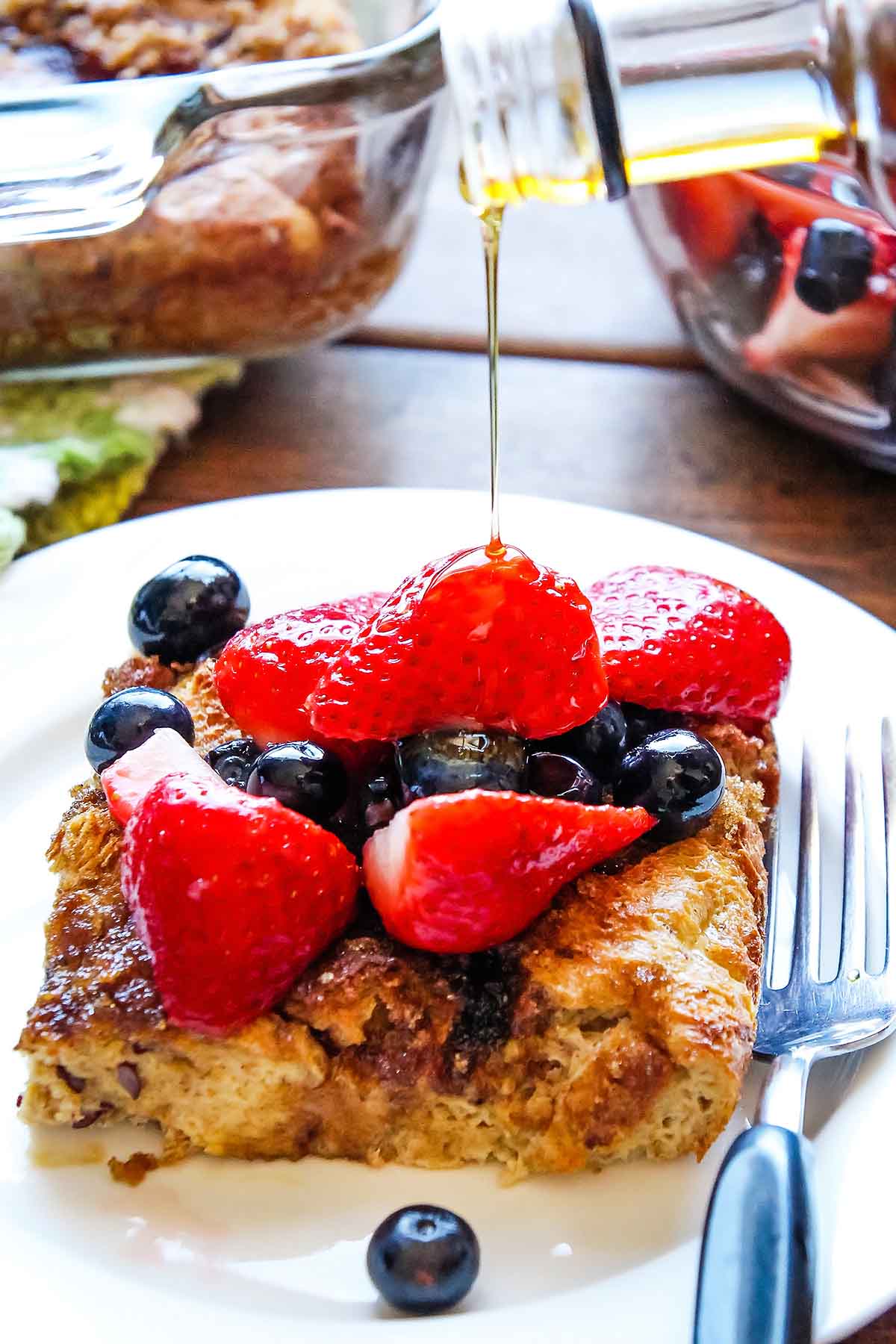 Bakes french toast serving drizzled with maple syrup