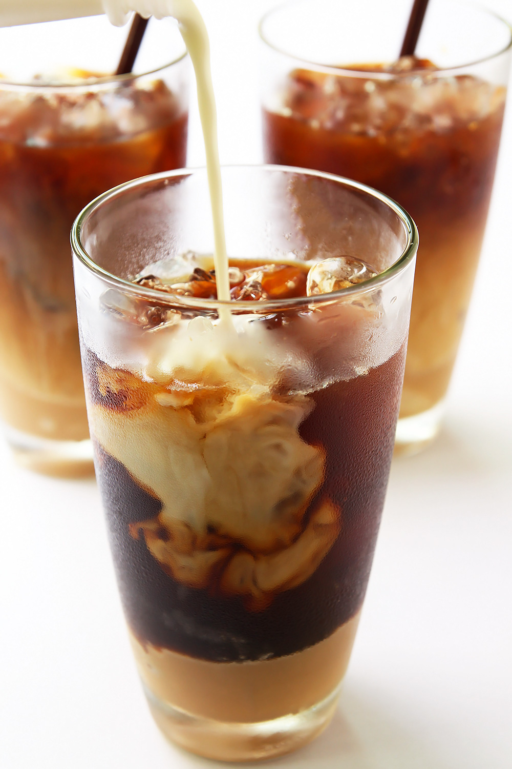 Pouring Vietnamese Iced Coffee