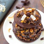 These delicious Coconut Flour German Chocolate Cake Pancakes make a decadent brunch treat perfect for Mother's Day. Gluten free coconut flour chocolate pancakes are topped with a luscious coconut pecan topping. Though decadent this recipe is clean eating and paleo friendly.
