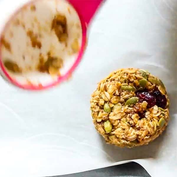 shaping breakfast cookies with measuring cup