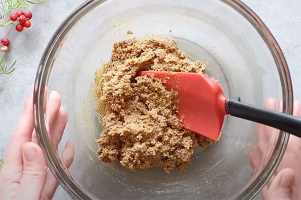 gingerbread cookie dough in bowl with spatula