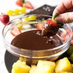Dipping Strawberry in Chocolate Fondue