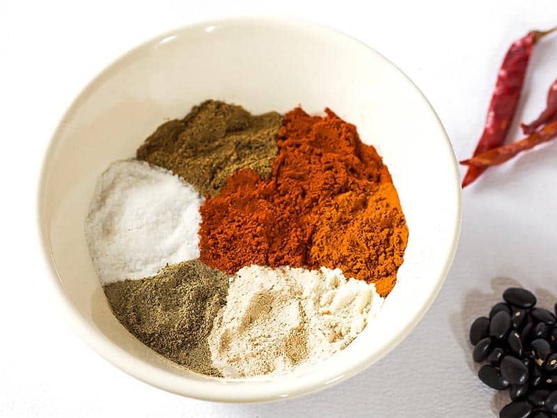 Individual Chili Seasoning Ingredients arranged unmixed in a bowl