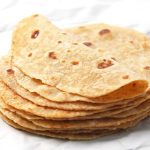 Stack of homemade whole wheat tortillas