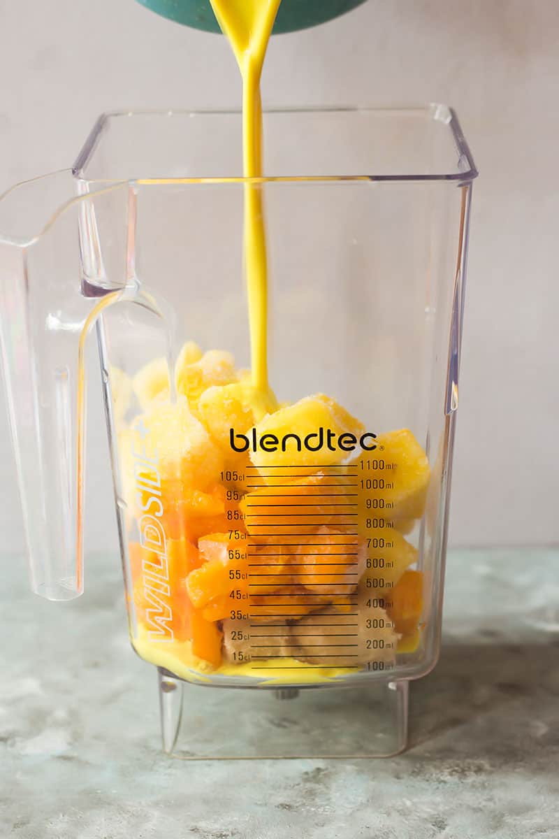 Mango Smoothie Bowl ingredients in a Blendtec blender jar