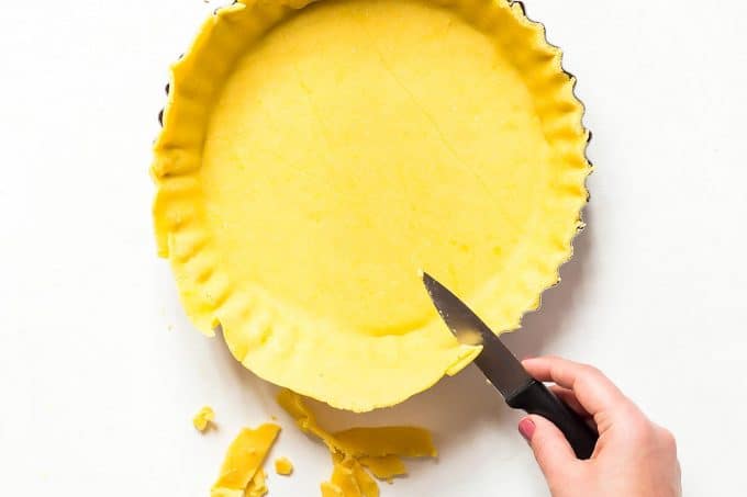 Small knife cutting overhang Gluten Free Pie Crust