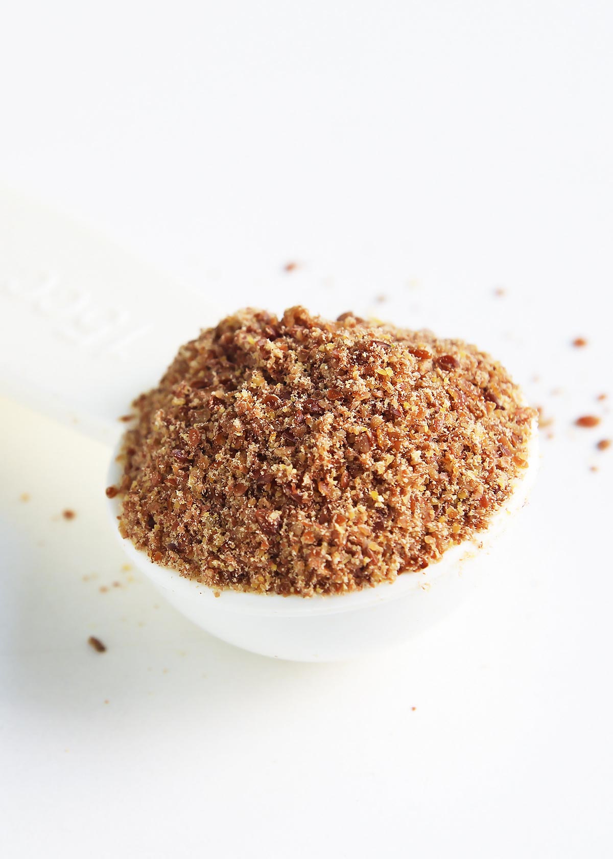 Ground Flax Meal in Measuring Spoon