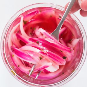 Easy pickled onions on a fork