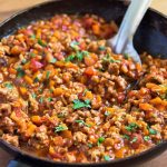 Easy Bolognese Sauce in pan with ladle