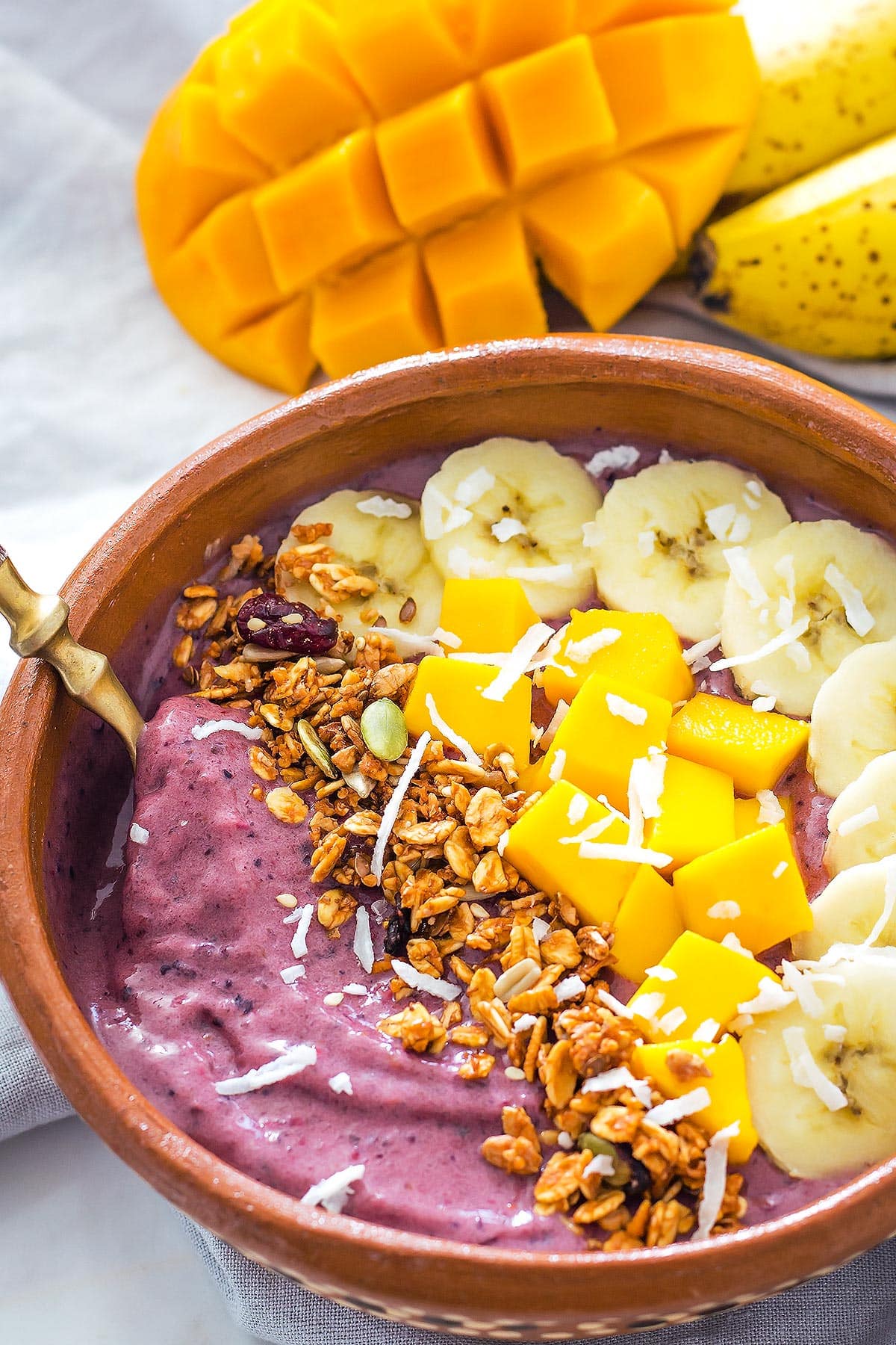 Spoon in Smoothie Bowl made with Acai Puree