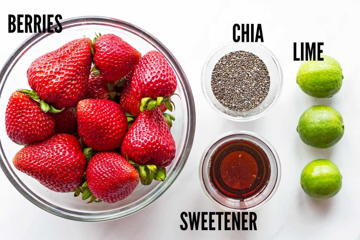 Ingredients for chia jam in a flat lay on white background 