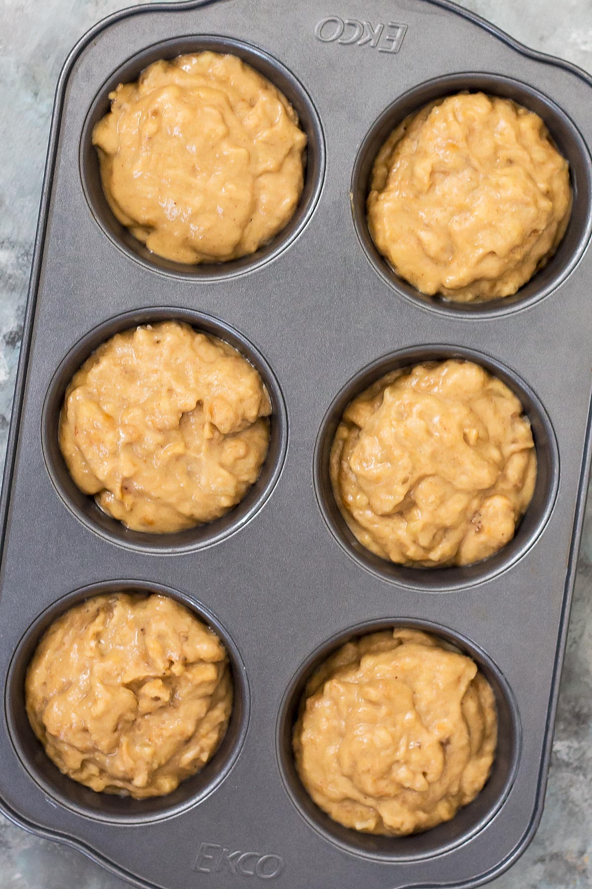 Raw Peanut Butter Muffin Batter in pan