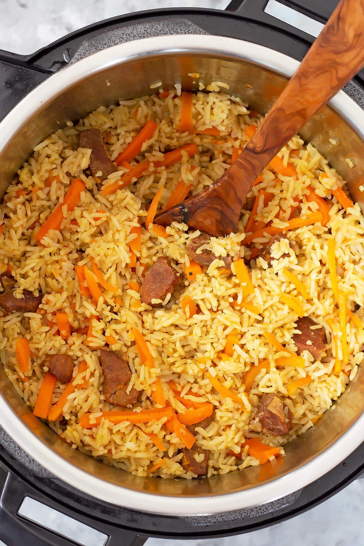 Fluffed up Instant Pot Rice Pilaf with beef and carrots