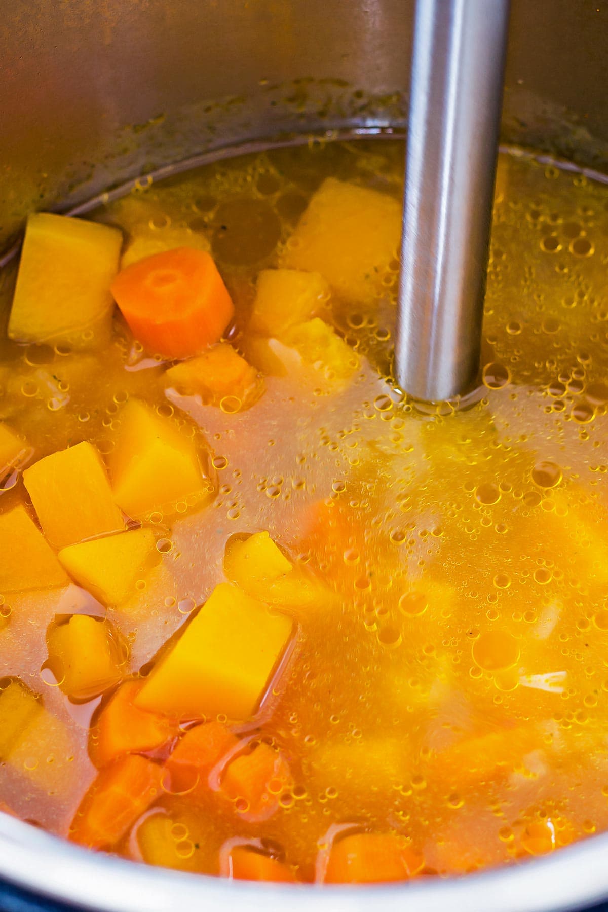 Immersion blender in instant pot squash soup