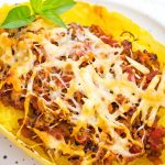 Spaghetti Squash Bolognese Boat with melted cheese
