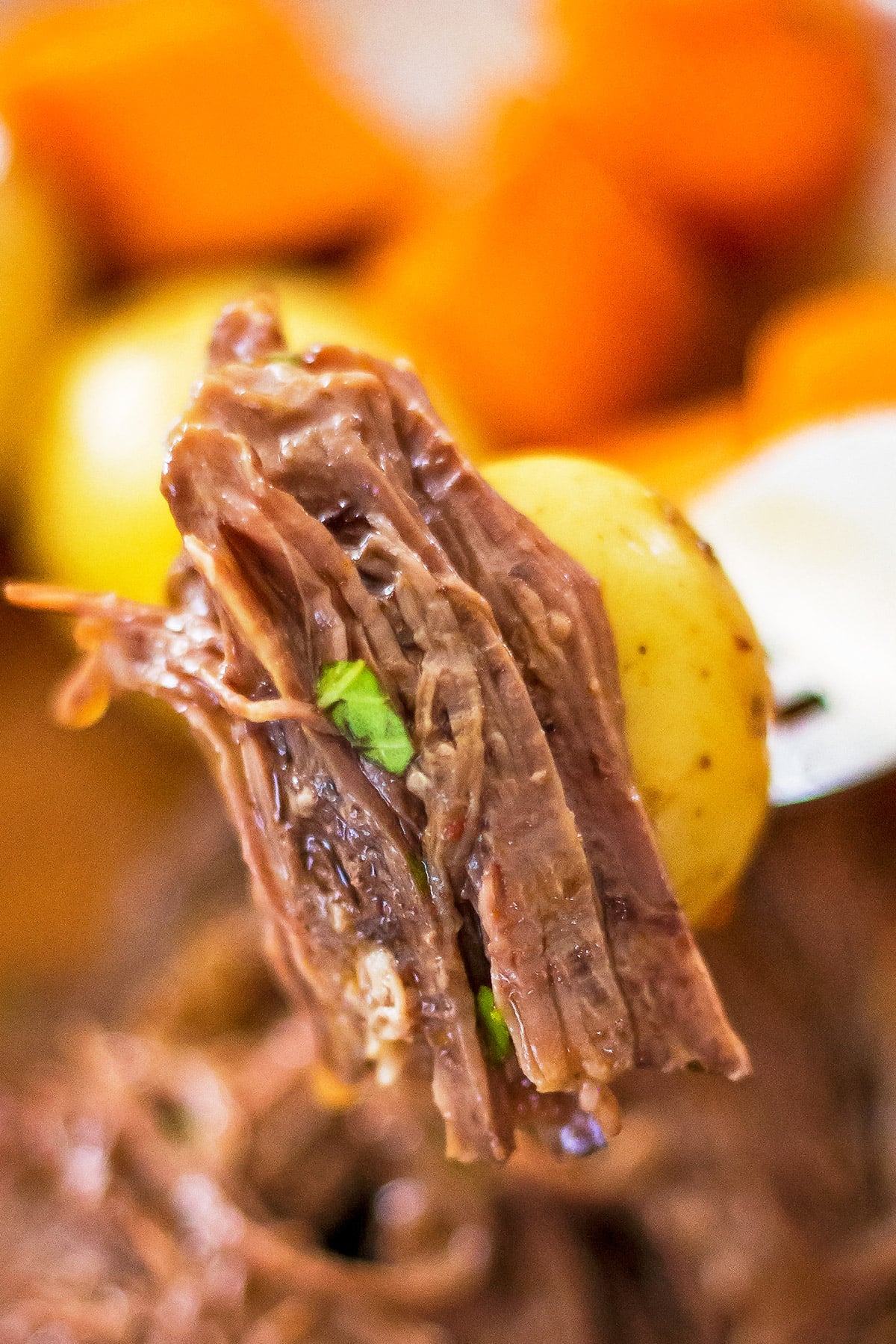 Pressure Cooker Pot Roast with potato on fork