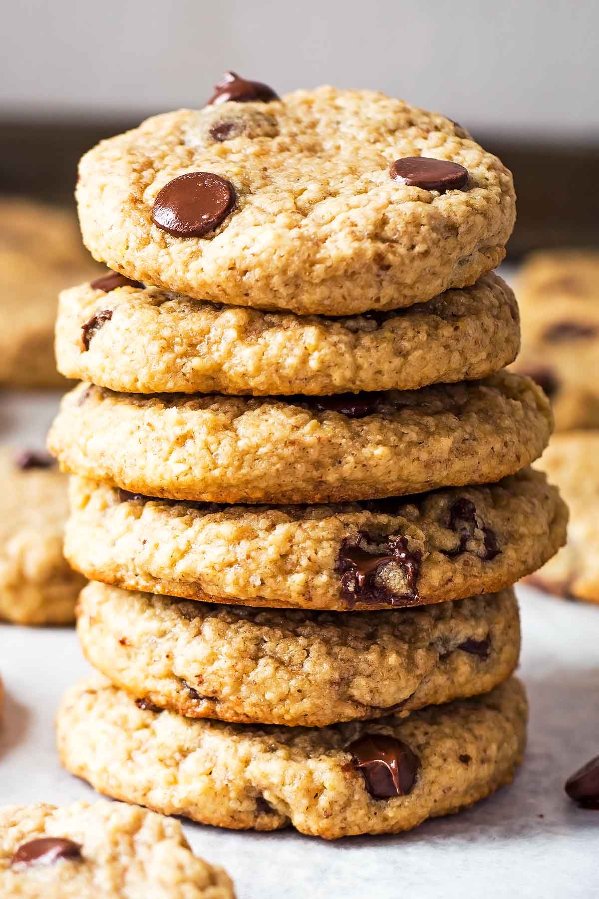 stack of gluten free chocolate chip cookies on baking sheet