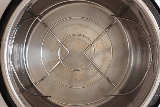 Instant Pot bottom with water and trivet