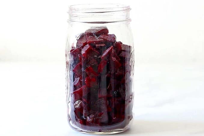 Mason jar filled with cooked beet cubes