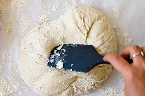 rubber spatula shaping dough