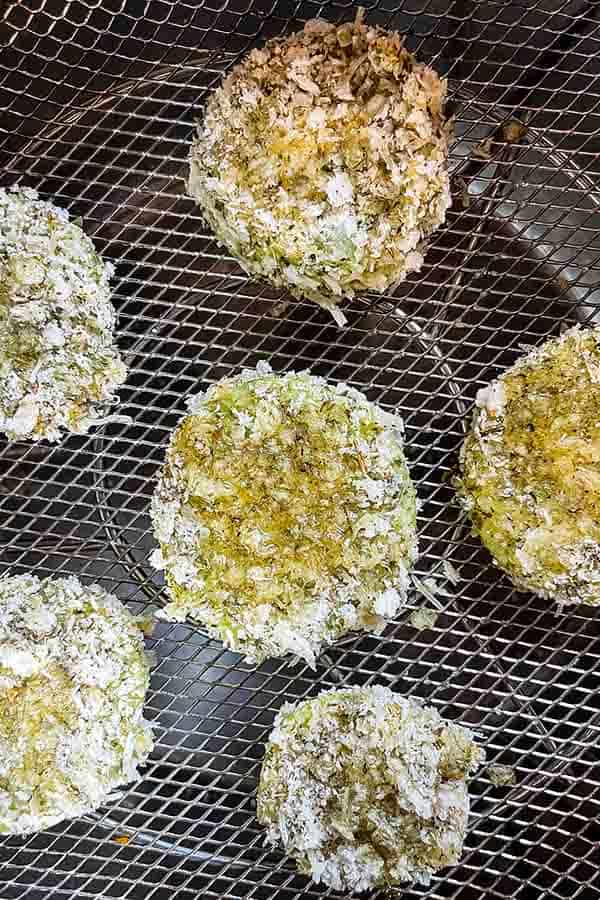 Breaded green tomatoes before air frying