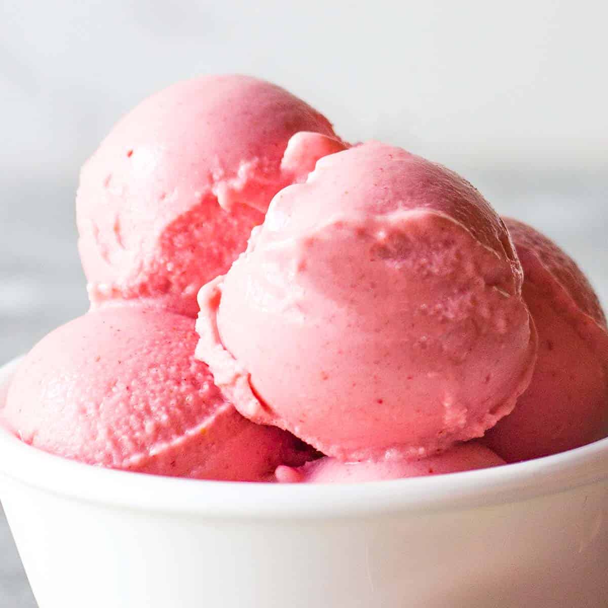 strawberry frozen yogurt scoops close up