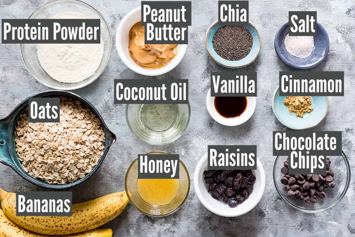 protein oatmeal cookie ingredients laid out in individual bowls 