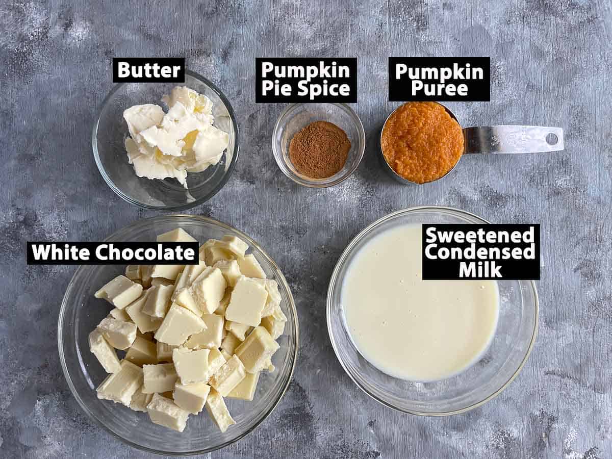 ingredients for pumpkin spice spice fudge laid out in individual bowls