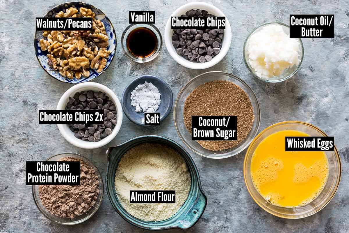 ingredients for protein brownies laid out in individual bowls
