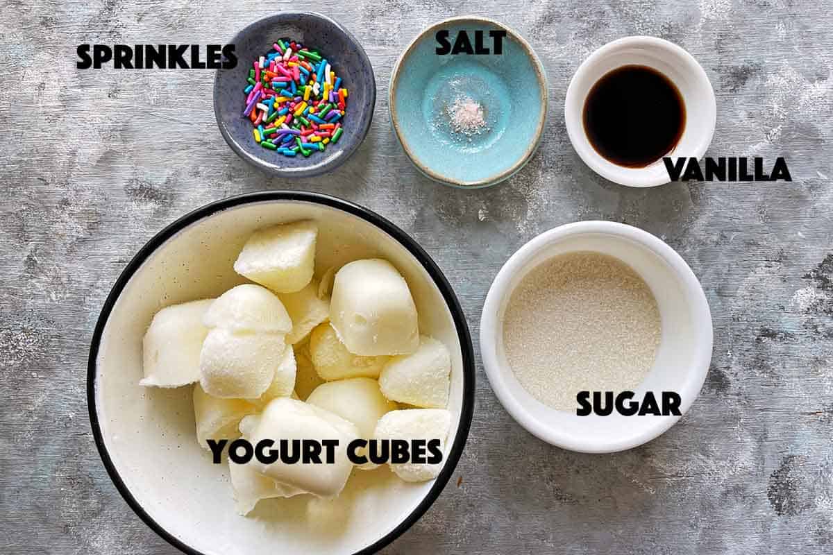ingredients for vanilla frozen yogurt in individual bowls