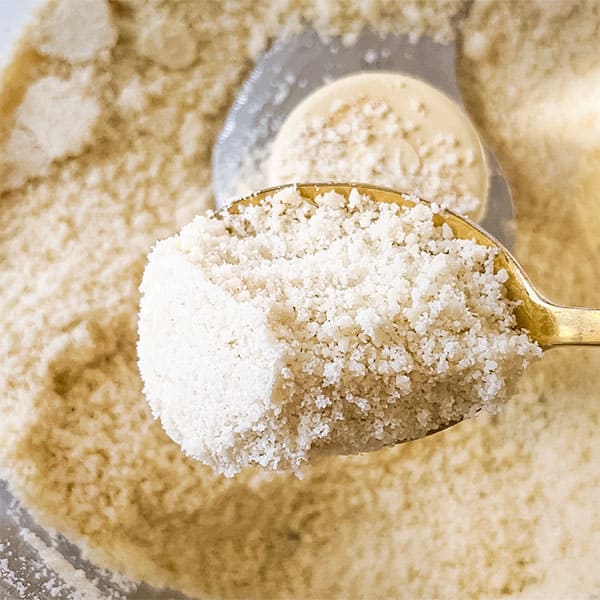 fine almond flour on spoon