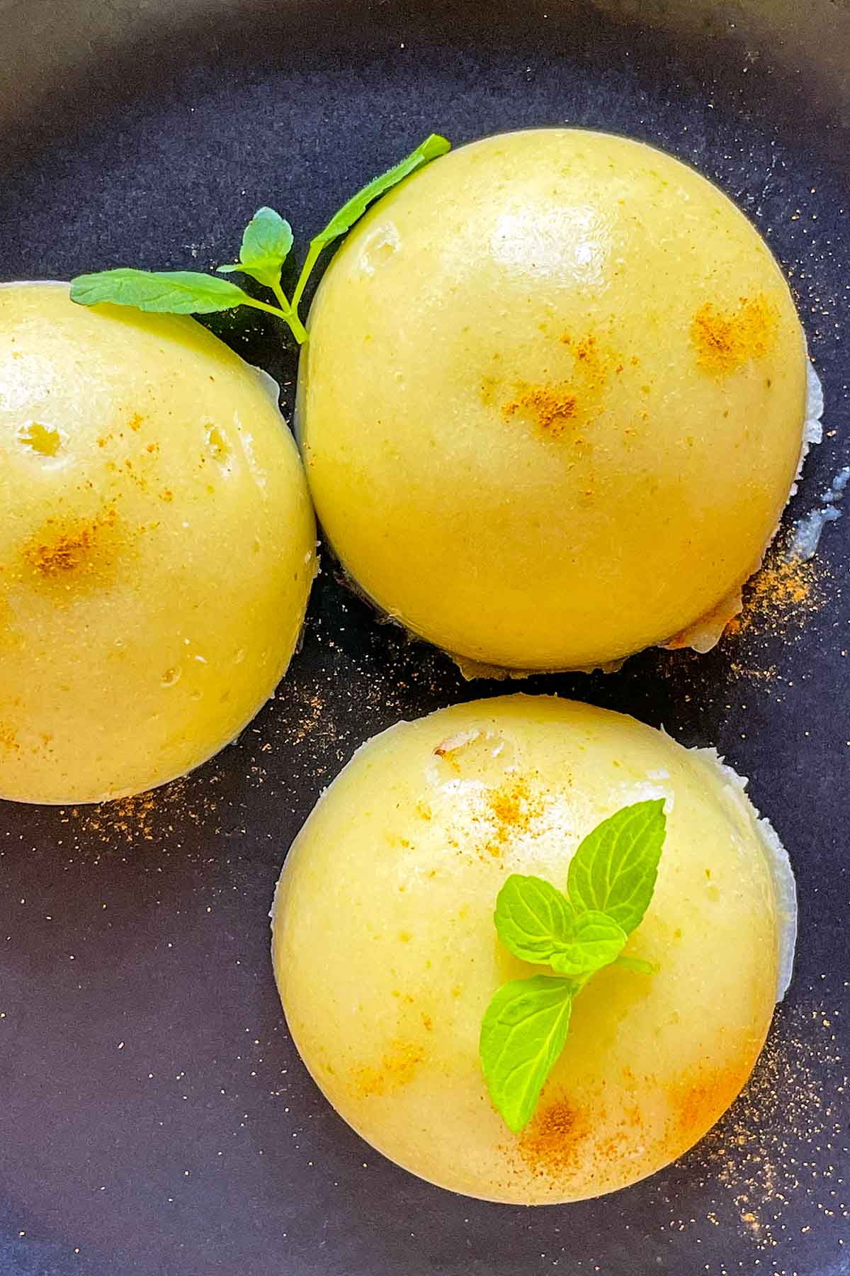 Healthy Pear Sorbet on black plate