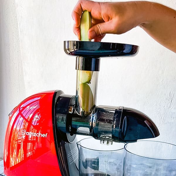 feeding produce through juicer chute