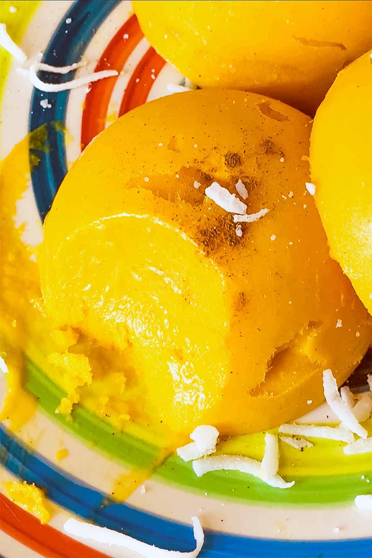 close up of creamy mango sorbet on plate